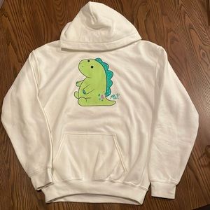 Selling Mariah Elizabeth white hoodie “Pickle The Dinosaur” merchandise. Size YL